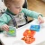 fat-brain-toys-playtab-sensoryczny-kwadrat-kola-zebate-810074275231-2.webp
